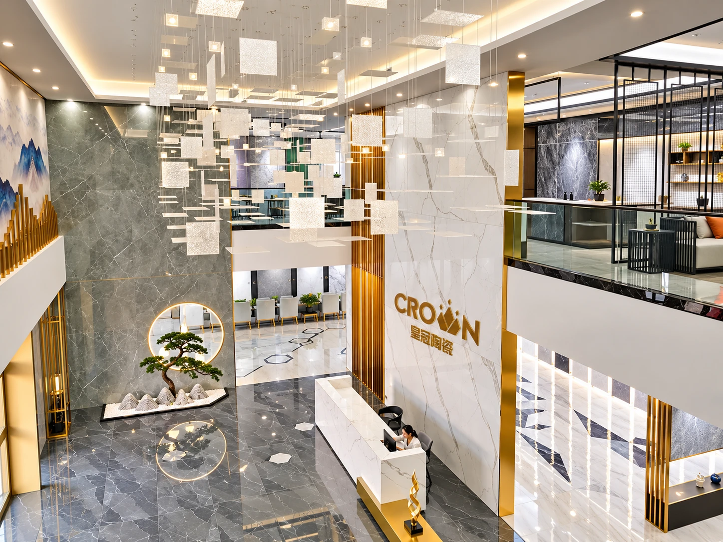 Crown showroom atrium with suspended lights, marble-look porcelain and the gold Crown logo — enhanced photograph