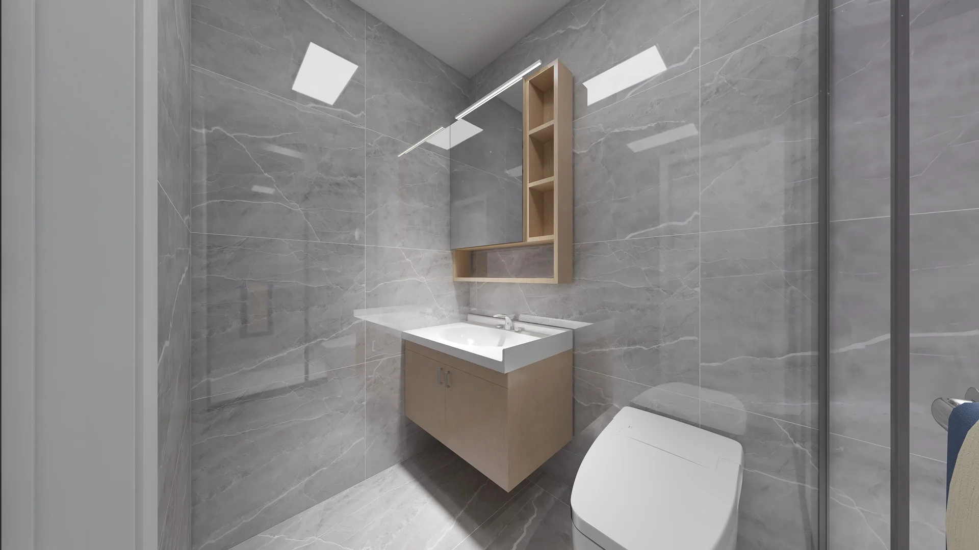 Grey marble-look bathroom with a floating vanity and glass shower