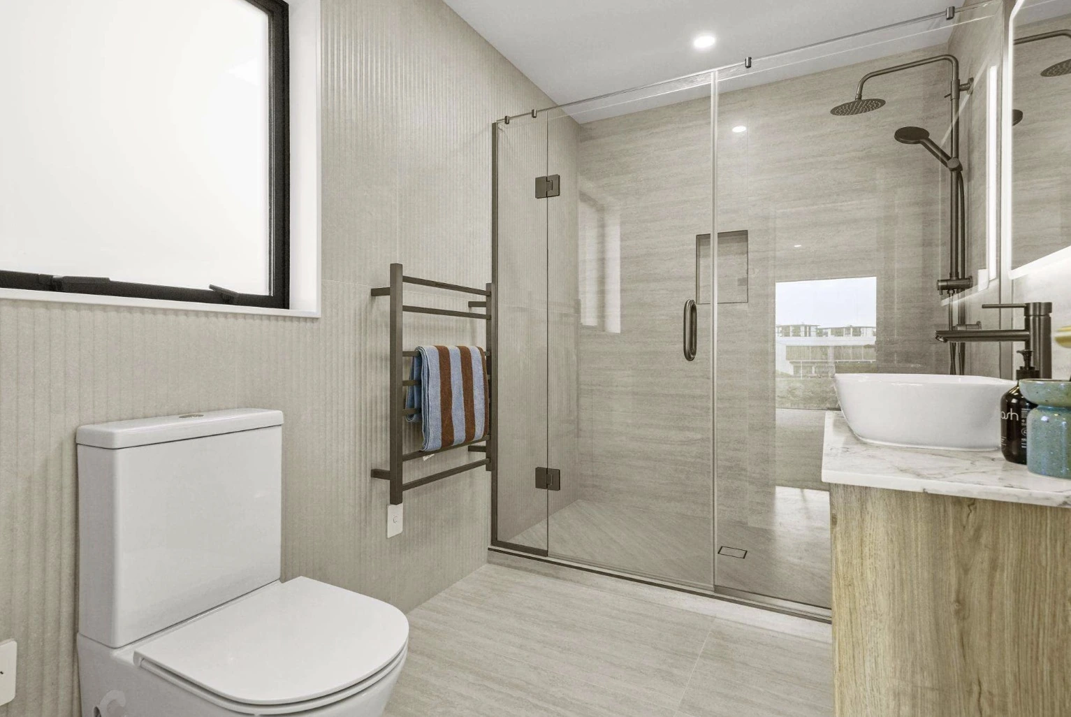 A compact beige bathroom with linear-relief porcelain beside a glazed shower
